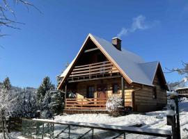 Domek pod lasem, hotel em Brenna