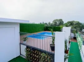 Munderi Green Mounts - Family Rooms with Swimming Pool