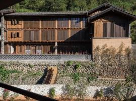Tsingpu Tulou Retreat 青普文化行馆 南靖土楼店, hôtel à Nanjing