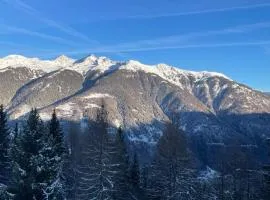 Appartamento panoramico con vista sulle montagne e accesso diretto alle piste