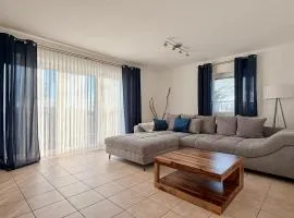 Ferienwohnung Muschel 1 mit Terrasse und Garten, Bensersiel