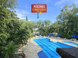 Fabuloso flat 243 Amarílis 2 piscinas climatizadas, carregador veiculo elétrico Riviera de São Lourenço, Bertioga Apartamento Duplex inteiro, cozinha equipada completa, serviço de praia, limpeza e trocas diária de toalhas, wi-fi 500mb, hotel i Riviera de São Lourenço