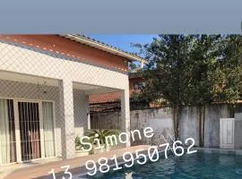 Casa espaçosa com Piscina e Churrasqueira 2 dorm