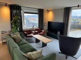 Family-friendly luxury penthhouse with three bedrooms, hotel en Stjørdal