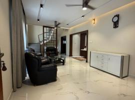 Serene Haven ,Modern Comfort Meets Calm: Kasaragod şehrinde bir otel