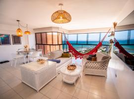 Beach front 9 min to airport DosLocosDeViaje, hotel in Maiquetía