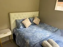 Sunny garden view suite with private bathroom