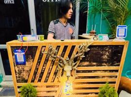 Hotel O Green Land Guest House, hotel em Tibri