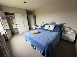 Sunny garden view suite with private bathroom