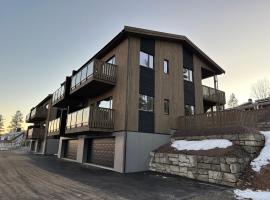 Motoppen Trysil Aparments, hotel com estacionamento em Trysil