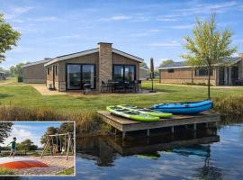 Traumhaus am Wasser Mit Boot, SUPs, Angeln, Family，坎彭的飯店