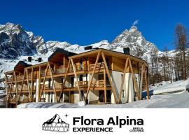 FLORA ALPINA EXPERIENCE - "Ski-to-Door" Brand New Chalet Apartments with Indoor Garage and Mountain View, hotel in Breuil-Cervinia