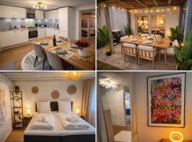 Gartenwohnung-Terrasse-3 Schlafzimmer-85ZollTV-Arcade, hotel en Schwabach