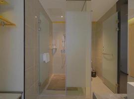 Echarm Hotel Foshan West Station Shishan Luocun, hotel in Luocun