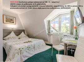 Willa Cyklada, grill, śniadania, jezioro,przystań,tawerna-200m, park linowy-400m, centrum,aquapark-900m, hotel per gli amanti del golf a Mikołajki