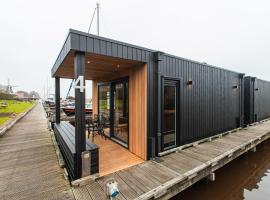 Tiny Boat House #4, hotel na praia em Garnwerd