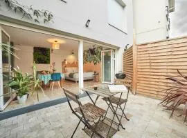 Studio LILAS avec terrasse au calme