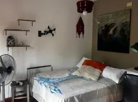 Habitación doble con balcón y pileta en las sierras Unquillo