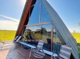 Chalé com hidromassagem de frente para a lagoa