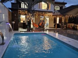 Comfortable house in Praia do Sonho - 10 people, viešbutis mieste Paljosa