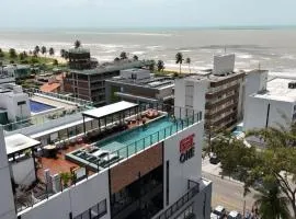 Flats a poucos metros do mar - Get One