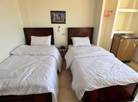 Pyramids Gold New Museum Hotel, hotel in Ghaţāţī