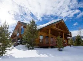 Miles Behind Log Cabin