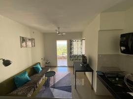 White Lotus Highway Den, hotel en Pune