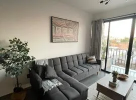 Stylish Brand New Condo Steps to Beach & Malecón