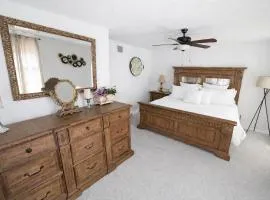 Spacious 4 bedroom 3 bath Clearwater Vacation House Cowboy Pool Fire Pit Games Close to Clearwater Beach Biking Trail Farmers Markets Harbor Health Spa Baycare Ballpark and Ruth Eckerd Hall Golf Courses