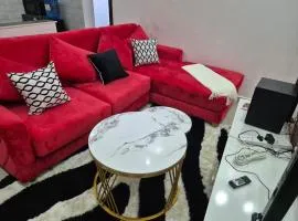 CM Snug stay -Naivegas Apartments