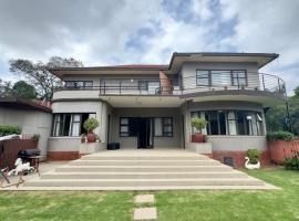 Houghton House Suites, hotel i Johannesburg