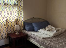 Maru Vibe Guest house at Panicsican San Juan Elyu, hotel i San Juan