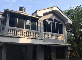 Monteiro Guesthouse, hotel i Benaulim