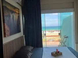 Suite 30 com vista incrível para o mar, ar condicionado, frigobar, banheiro, 5 metros da praia