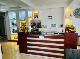 Grand Tiara Hotel, hotel em Munyu