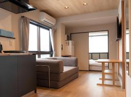 AURA YUZAWA Apartment Hotel - 1Bedroom Apartment with Living Dining Kitchen Sleeps 2 to 4, Bedroom with 2-Double Bed, Living Room with 1-Sofa Bed, hotel in Yuzawa