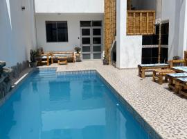 Olas inn, hotel ad Asia