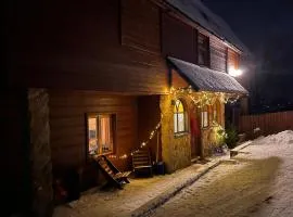 Dom w Sadzie Frydrychówka