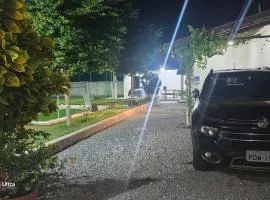 Casa de praia com campo de futebol e piscina