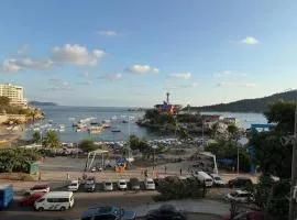 Apartamento con vista hermosa y playa caleta