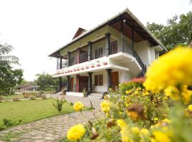 Mango Village Resort, hotel em Kollengode