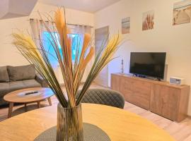 Ferienwohnung am Sieltor Neßmersiel, готель у місті Дорнум