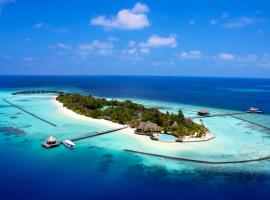 Komandoo Island Resort & Spa, hôtel à Komandoo