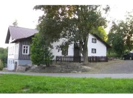 Holiday home in a quiet, authentic mountain village with a view of the surrounding hills