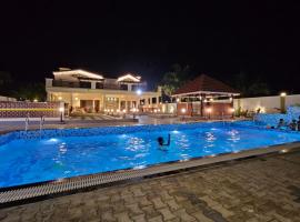 Kurunchi Malar Resorts: Hosūr şehrinde bir otel