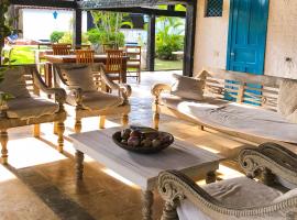 Peixe Crew Manguinhos，位于布希奥斯的酒店