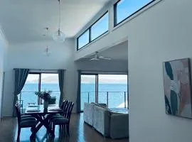 Peaceful Waterfront Retreat with Private Jetty Near Train