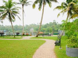 Perumanseri에 위치한 호텔 Mango Lantern Villa ,Kollam
