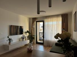 Chic & Cozy City Apartment near Nivy Station, Hotel in Nivy